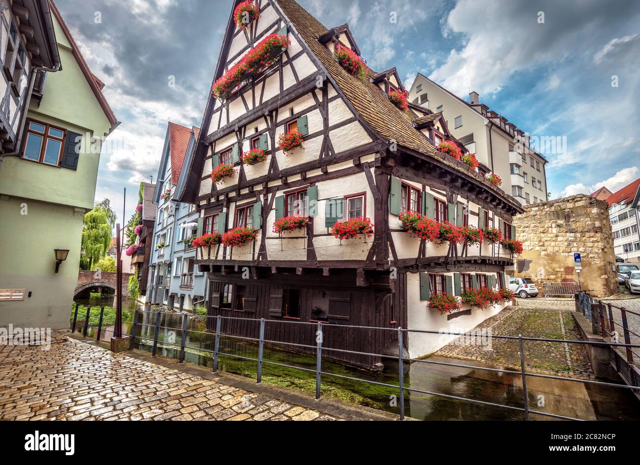 Hotel Schiefes Haus or Crooked House in Ulm city, Germany. It is landmark of Ulm located in old Fisherman`s Quarter. Swabian vintage half-timbered hou Stock Photo